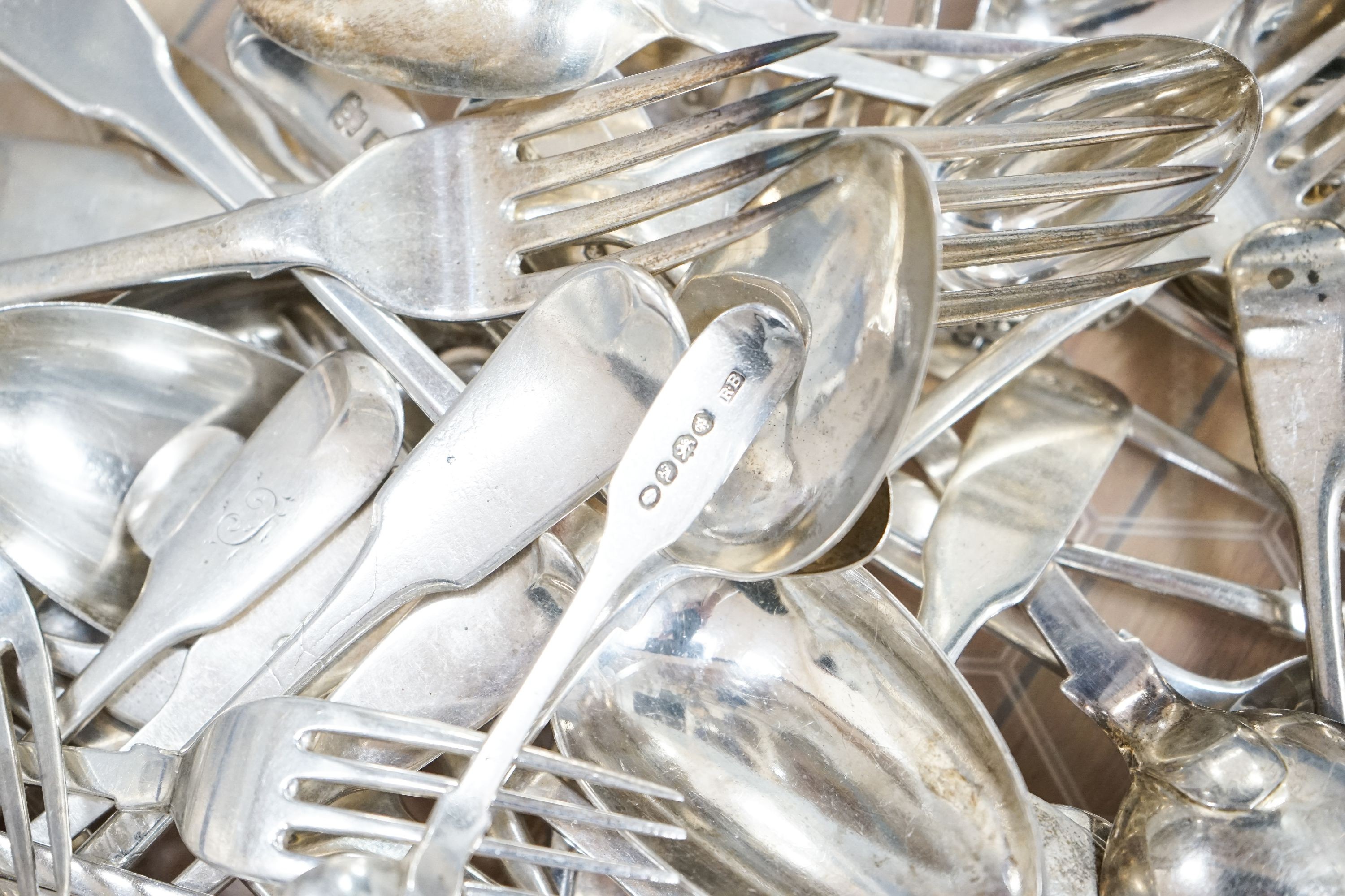 A mixed quantity of assorted mainly 19th century silver flatware, various dates, maker's and patterns, 65.5 oz.